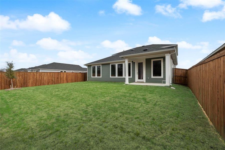 Exterior details and patio area of a home in Creekside of Crowley, Crowley (Image 3).