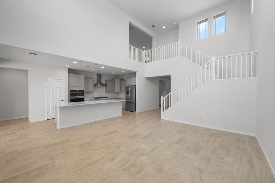 Spacious, unfurnished interior of a new home in Blossom Rock, Apache Junction (Image 22).