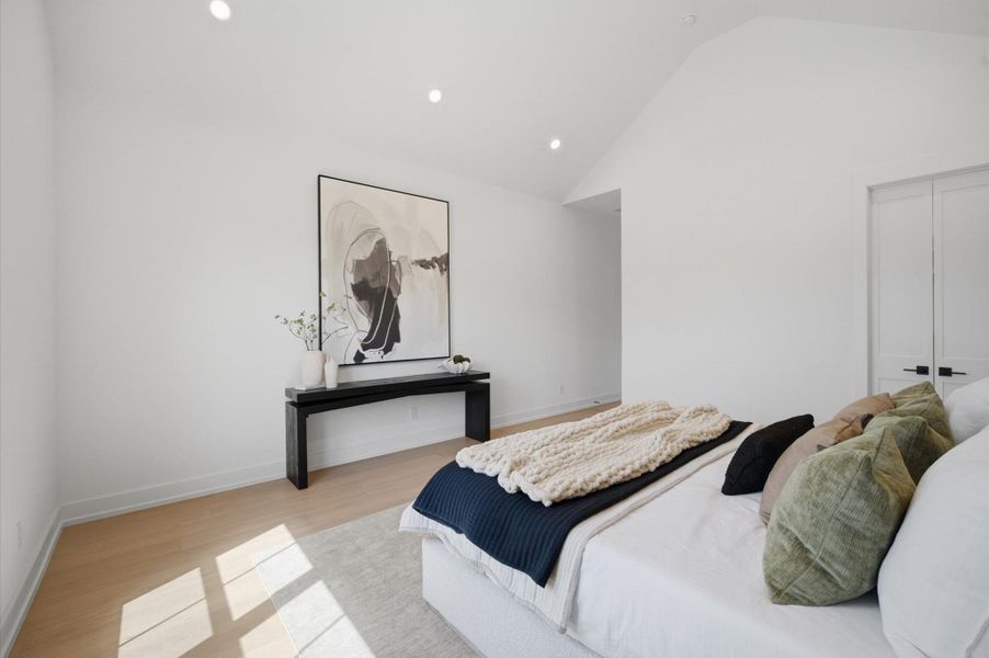 Another view of the primary bedroom.