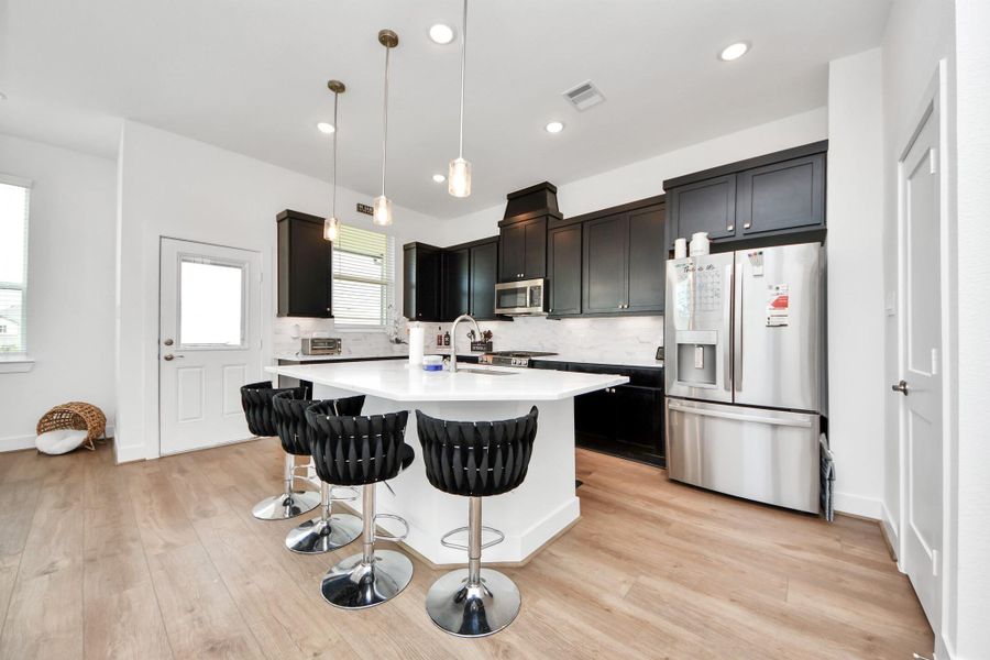 Furnished interior view inside a new home in Meridiana Courtyard Collection, Manvel (Image 31).