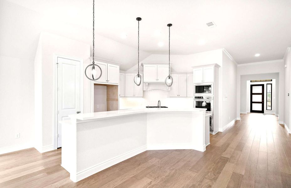 Furnished interior view inside a new home in Bridgeland 50′, Cypress (Image 6).