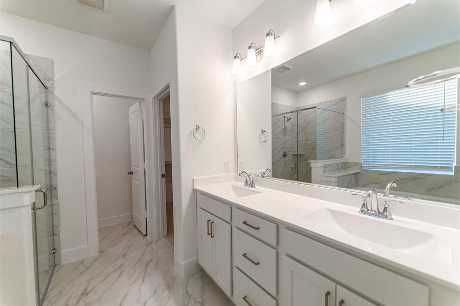 Furnished interior view inside a new home in Sunterra, Katy (Image 3).