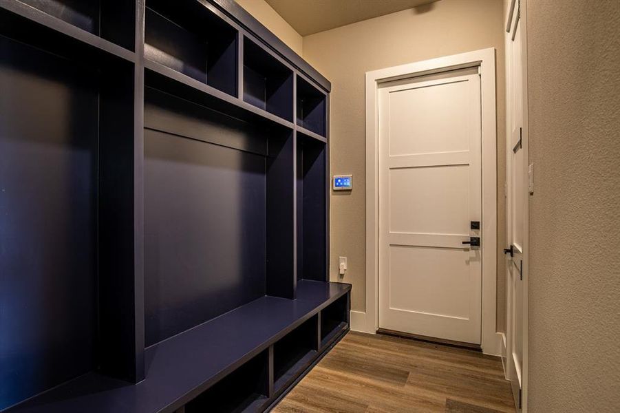 Grand mudroom leading to the 4 car garage