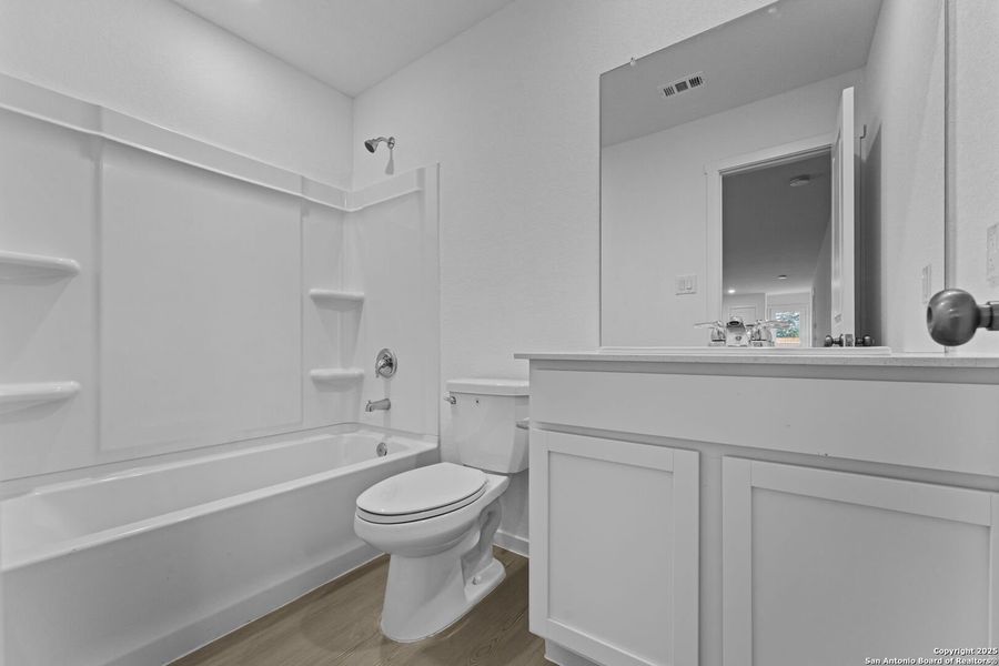 Furnished interior view inside a new home in Torian Village: Belmar Collection, San Antonio (Image 5).