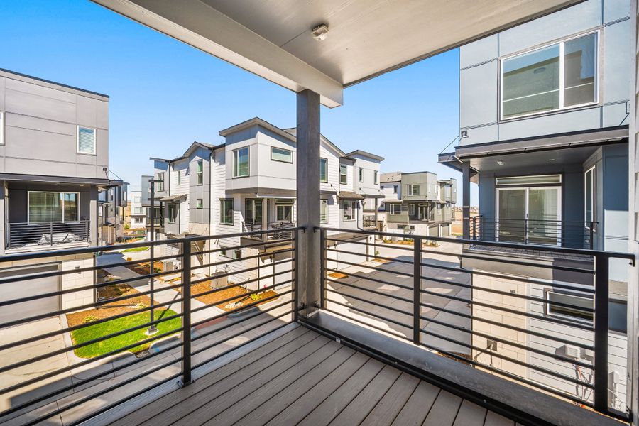 Exterior details and patio area of a home in Lyric at RidgeGate Townhomes, Lone Tree (Image 4). Exterior details and patio area of a home in Lyric at RidgeGate Townhomes, Lone Tree (Image 4).