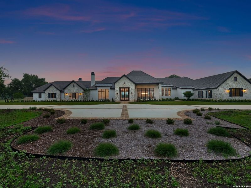 Front exterior of a new home in , Boerne, TX, highlighting curb appeal (Image 23).