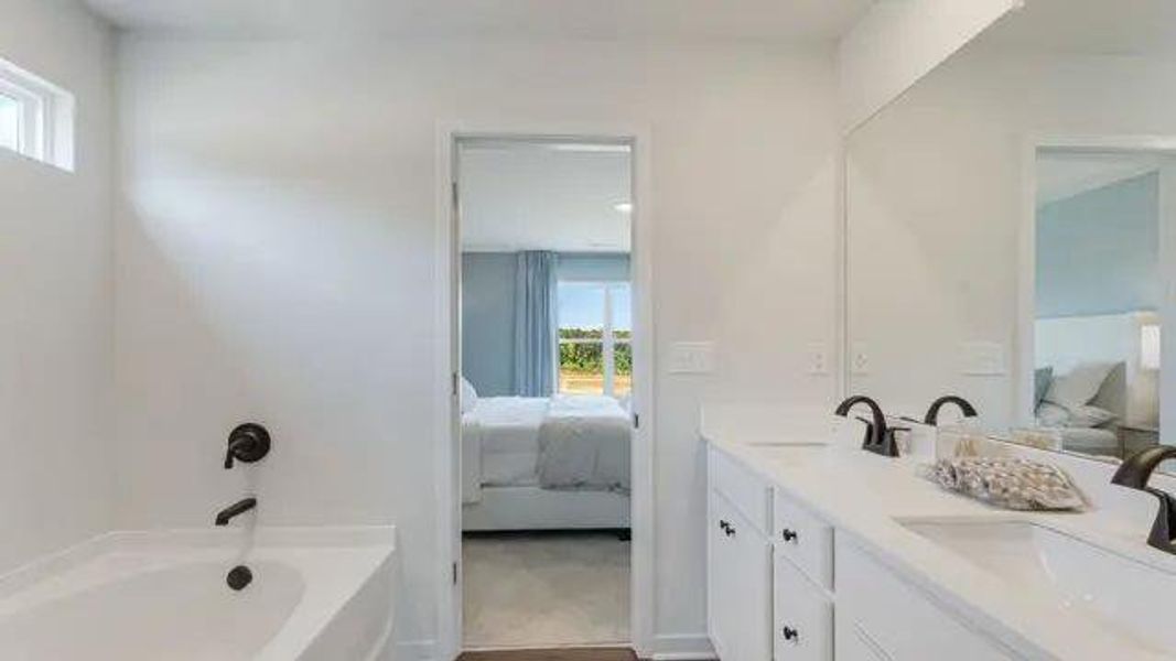 Furnished interior view inside a new home in Reserve at Gum Springs, Jefferson (Image 15).