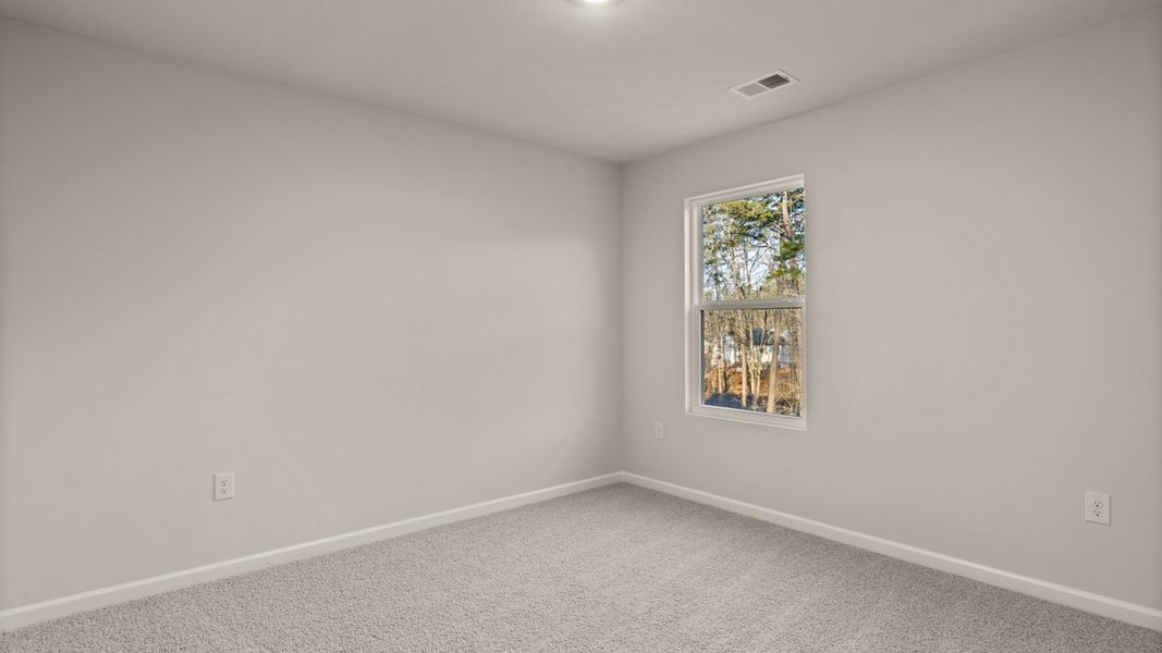 Spacious, unfurnished interior of a new home in Brooks Station, Dacula (Image 25).