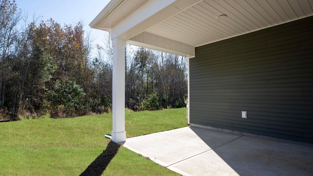 Exterior details and patio area of a home in Indigo Preserve, Leland (Image 2).
