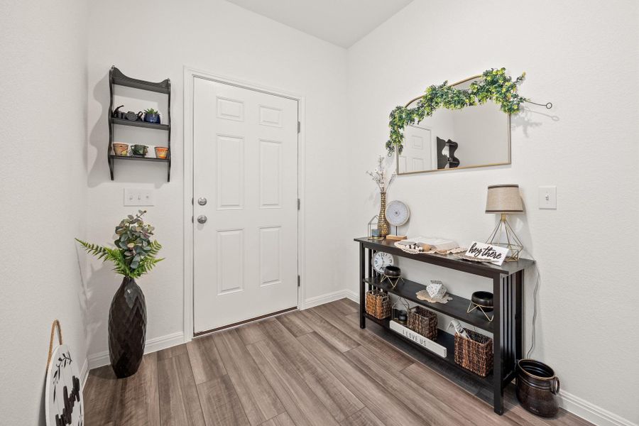 Entryway featuring a six-panel door
