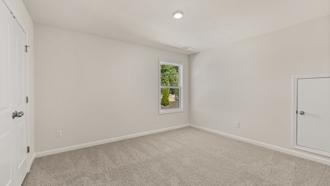 Representative unfurnished interior of a home built from the WINDSOR by D.R. Horton in Butner Estates, South Fulton (Image 63).