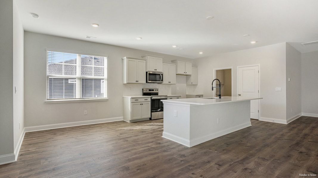 Representative furnished interior of a home built from the Delmont by D.R. Horton in Merchant Point, Jacksonville (Image 7).