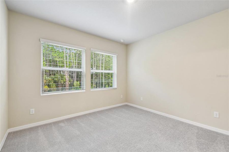 Spacious, unfurnished interior of a new home in Preserve at The Cays – The Harbor Series, Daytona Beach (Image 17). Spacious, unfurnished interior of a new home in Preserve at The Cays – The Harbor Series, Daytona Beach (Image 17).