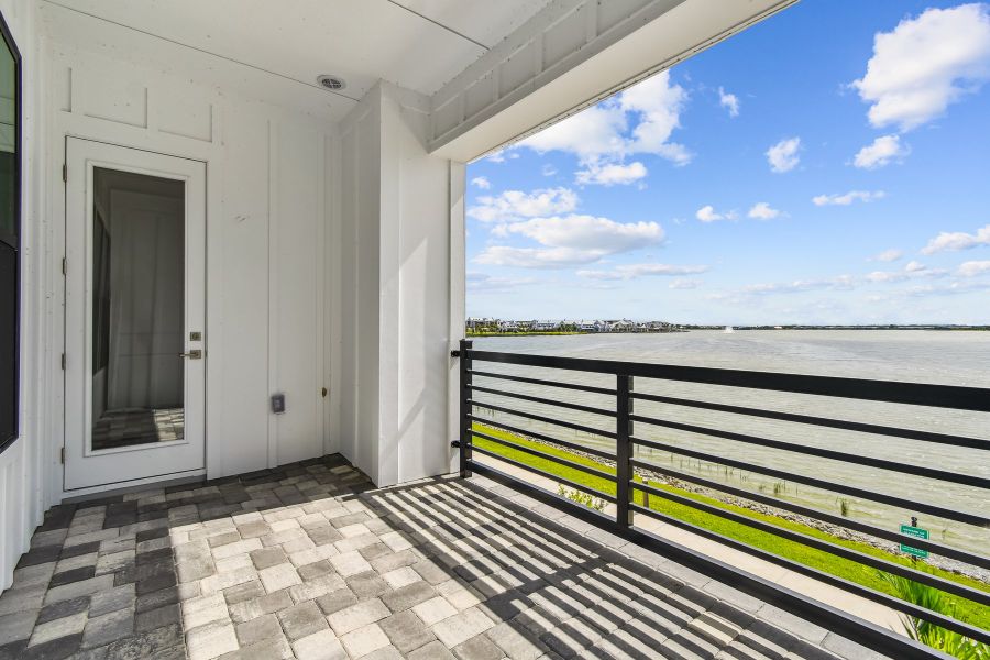 Exterior details and patio area of a home in Emerald Landing at Waterside at Lakewood Ranch – City Homes, Sarasota (Image 3).