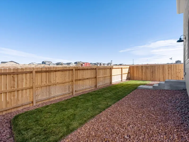 Exterior details and patio area of a home in Lorson Ranch: The Trail Collection, Colorado Springs (Image 3).