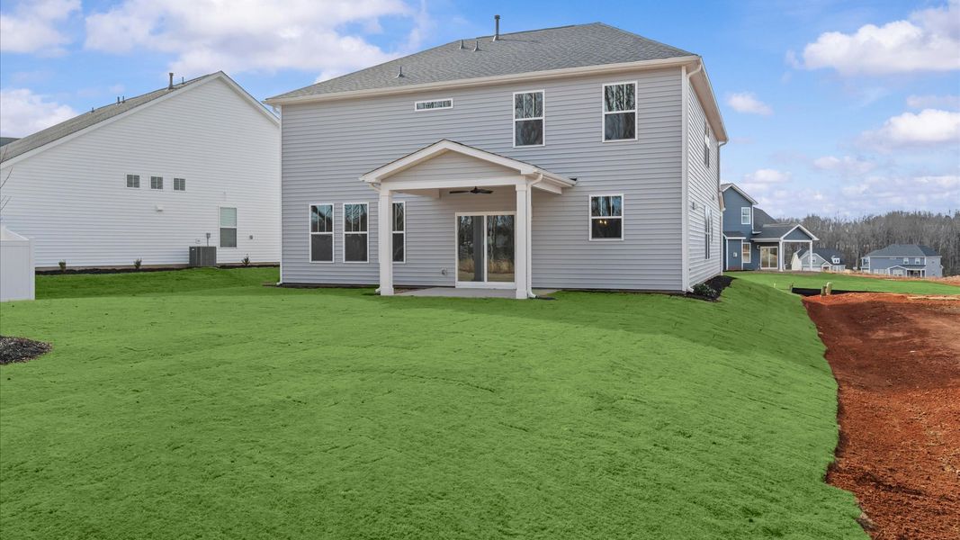 Exterior details and patio area of a home in Fox Hollow, Spartanburg (Image 4).