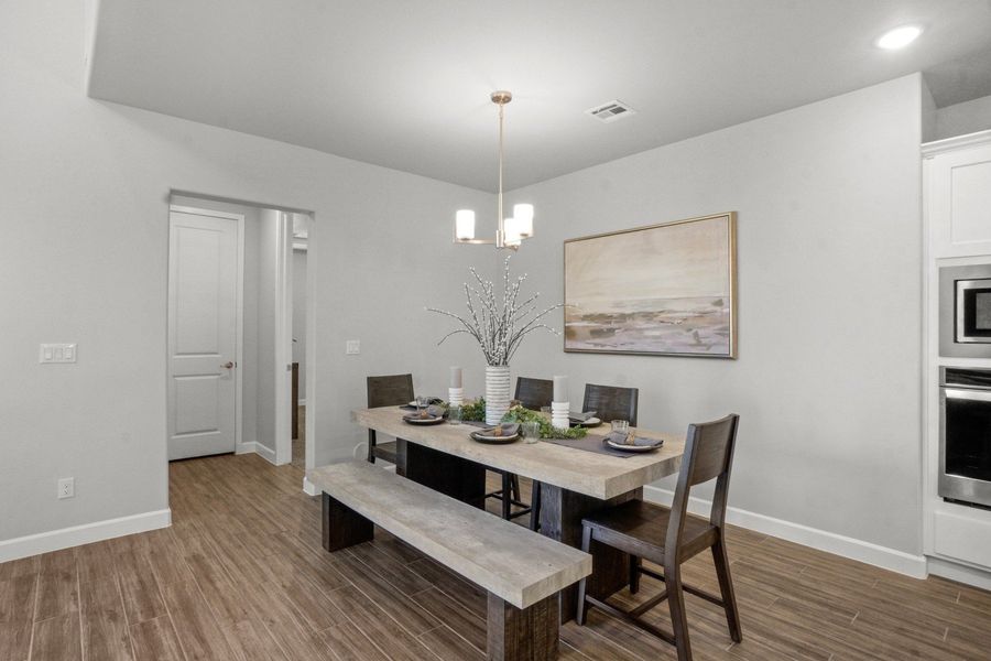 Representative furnished interior of a home built from the Capitan by Hakes Brothers in Hillside Park, El Paso (Image 25).