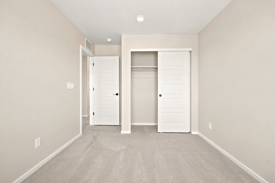 Spacious, unfurnished interior of a new home in Sky Ranch, Watkins (Image 25).