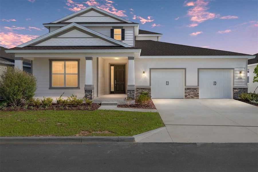 Front exterior of a new home in Calesa Township, Ocala, FL, highlighting curb appeal (Image 19). Front exterior of a new home in Calesa Township, Ocala, FL, highlighting curb appeal (Image 19).