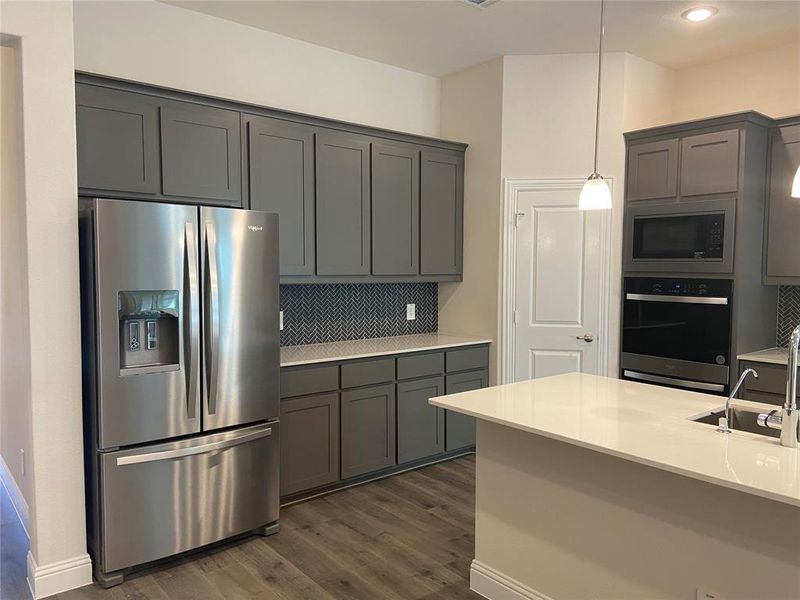 Furnished interior view inside a new home in Bear Park Estates, Euless (Image 8).
