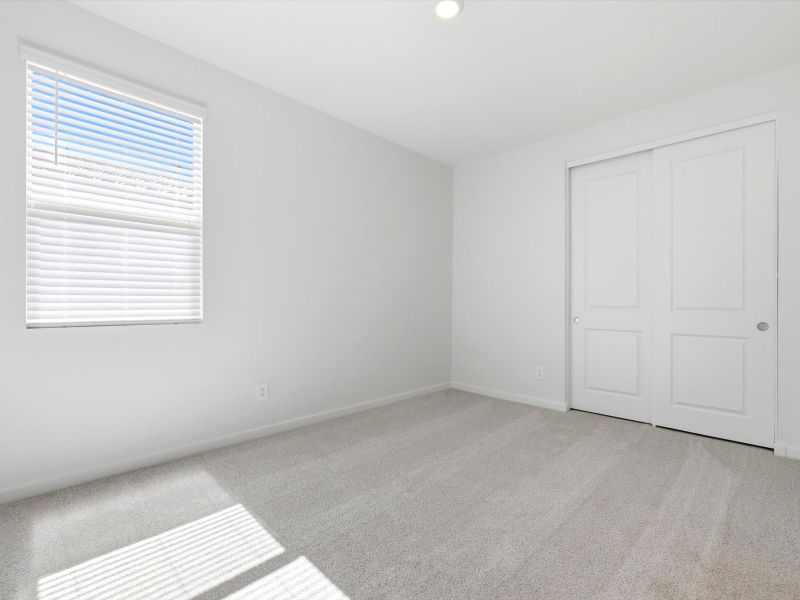 Spacious, unfurnished interior of a new home in White Tank Foothills Reserve Series, Waddell (Image 20).