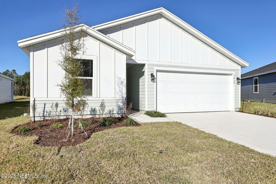 Front exterior of a new home in , Jacksonville, FL, highlighting curb appeal (Image 19).