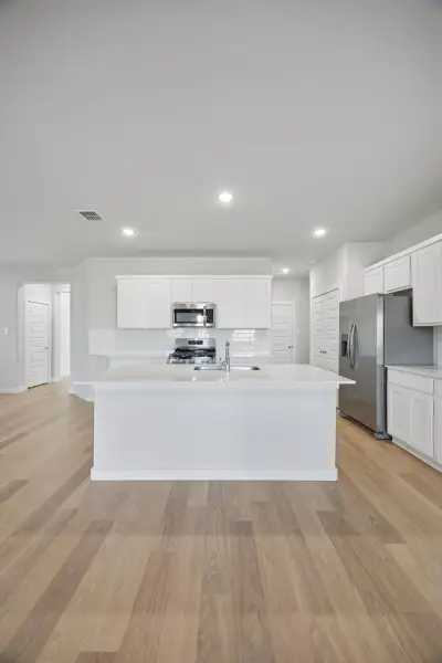 Kitchen in the Oak II home plan by Trophy Signature Homes – REPRESENTATIVE PHOTO Kitchen in the Oak II home plan by Trophy Signature Homes – REPRESENTATIVE PHOTO