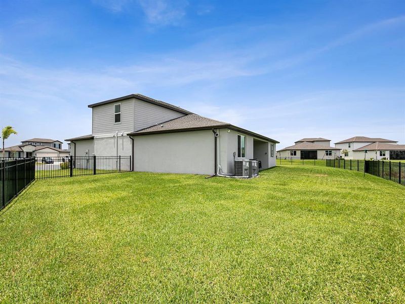 Exterior details and patio area of a home in , Parrish (Image 23).