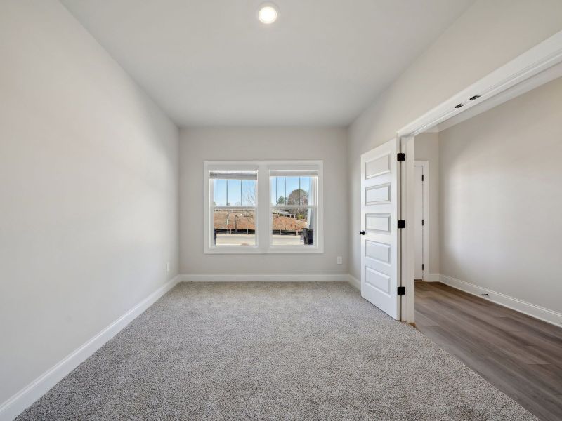 Spacious, unfurnished interior of a new home in Martin Springs - Estate Series, Lawrenceville (Image 14).