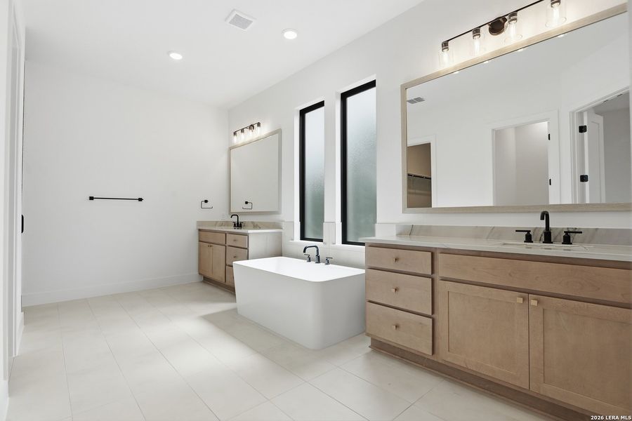 Furnished interior view inside a new home in Enchanted Bluff, San Antonio (Image 12).