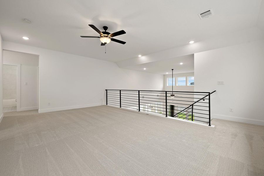 Spacious, unfurnished interior of a new home in Blackhawk in Pflugerville, Pflugerville (Image 24).
