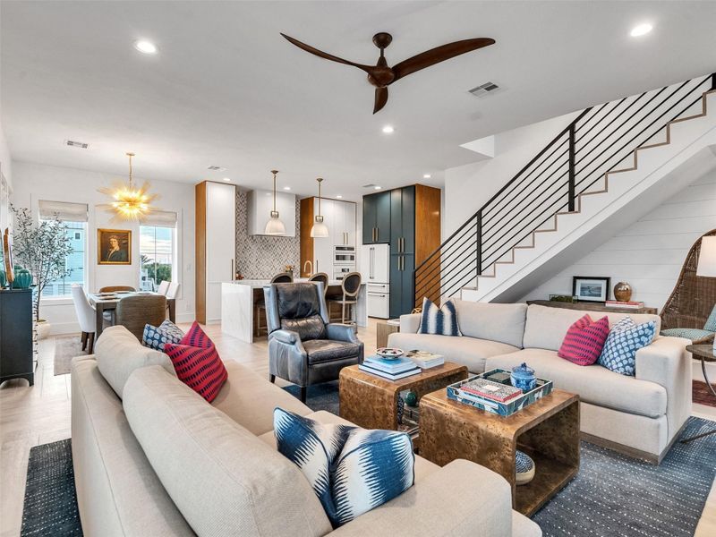 Experience effortless flow between the dining, kitchen, and living areas — perfect for entertaining or relaxing after a beach day. Bright, airy, and filled with smart-home conveniences and energy-saving features, this space makes every moment feel like a seaside celebration! Experience effortless flow between the dining, kitchen, and living areas — perfect for entertaining or relaxing after a beach day. Bright, airy, and filled with smart-home conveniences and energy-saving features, this space makes every moment feel like a seaside celebration!