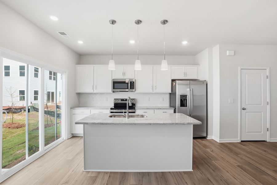 Furnished interior view inside a new home in Sloan Station, Charlotte (Image 11).