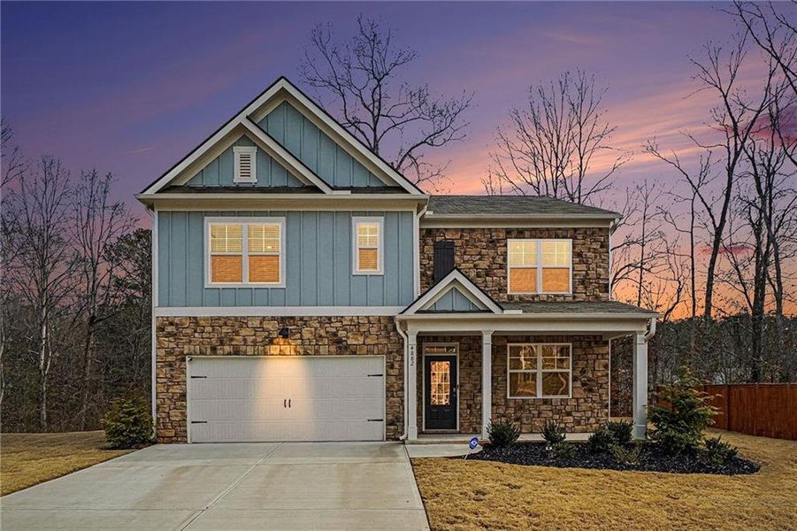 Front exterior of a new home in , Powder Springs, GA, highlighting curb appeal (Image 17).