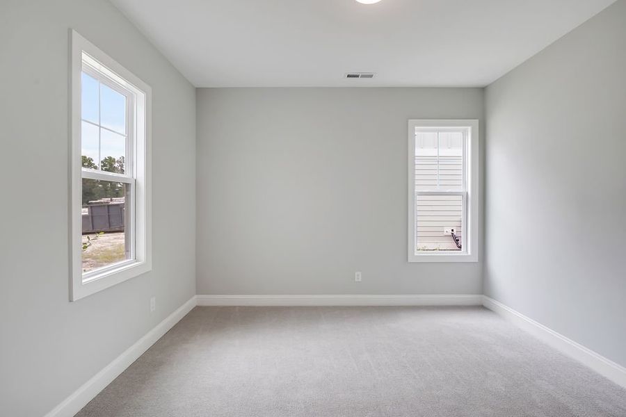 Spacious, unfurnished interior of a new home in Brunswick Forest, Leland (Image 19). Spacious, unfurnished interior of a new home in Brunswick Forest, Leland (Image 19).