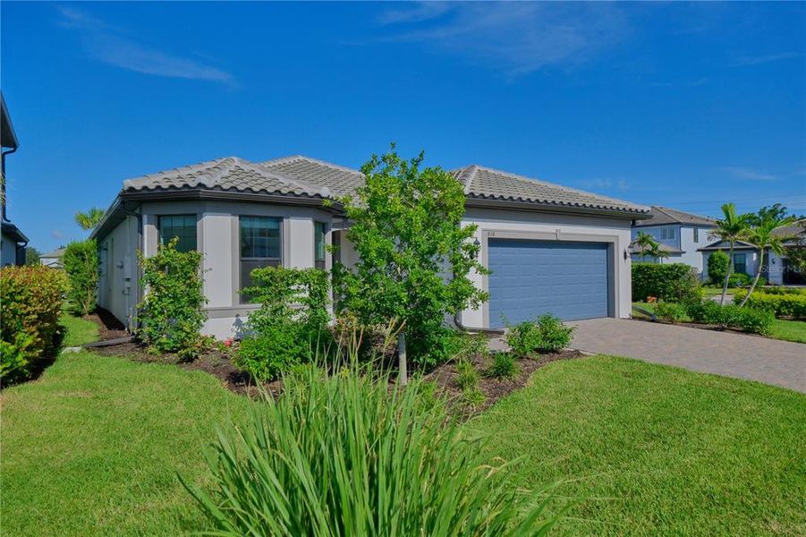 Front exterior of a new home in , Bradenton, FL, highlighting curb appeal (Image 29). Front exterior of a new home in , Bradenton, FL, highlighting curb appeal (Image 29).