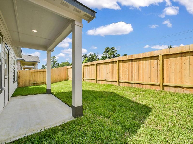 Exterior details and patio area of a home in Lakes at Black Oak, Magnolia (Image 22). Exterior details and patio area of a home in Lakes at Black Oak, Magnolia (Image 22).