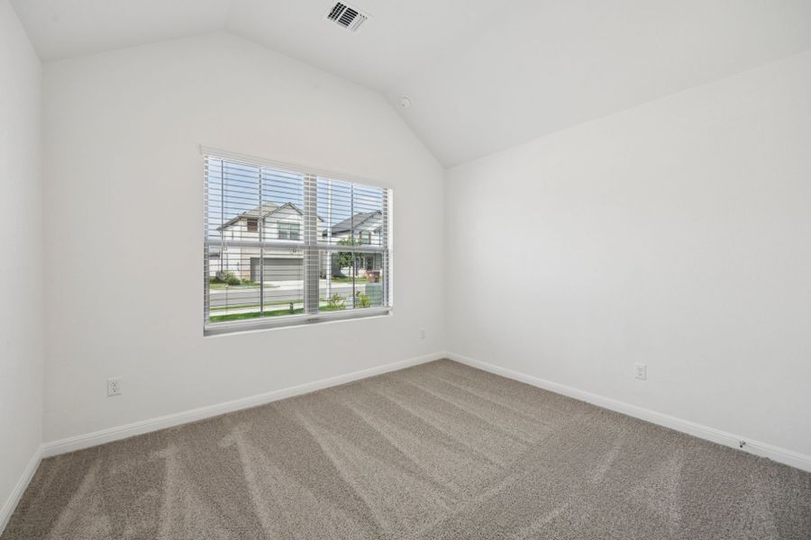 Bedroom in the Pinehurst home plan by Trophy Signature Homes - REPRESENTATIVE PHOTO Bedroom in the Pinehurst home plan by Trophy Signature Homes - REPRESENTATIVE PHOTO