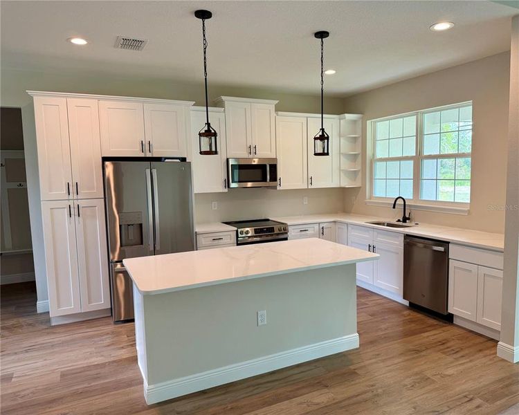 Furnished interior view inside a new home in , Dunnellon (Image 8).