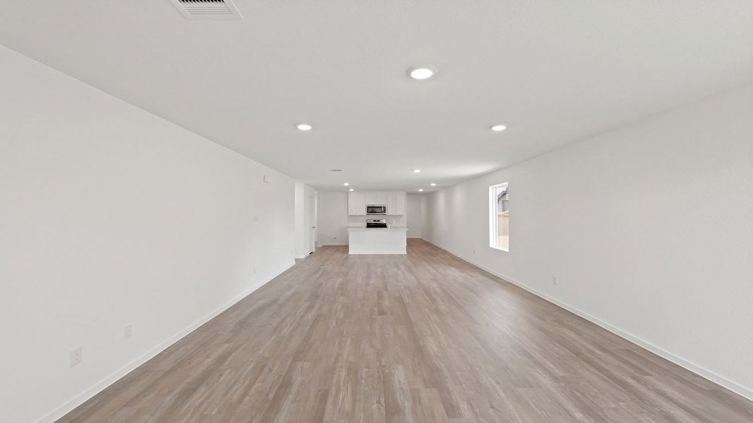 Representative unfurnished interior of a home built from the Estero by D.R. Horton in Lake Conroe Cove, Willis (Image 17). Representative unfurnished interior of a home built from the Estero by D.R. Horton in Lake Conroe Cove, Willis (Image 17).