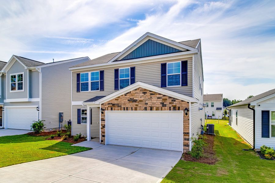 Front exterior of a new home in Bluefield, Lexington, SC, highlighting curb appeal (Image 2). Front exterior of a new home in Bluefield, Lexington, SC, highlighting curb appeal (Image 2).