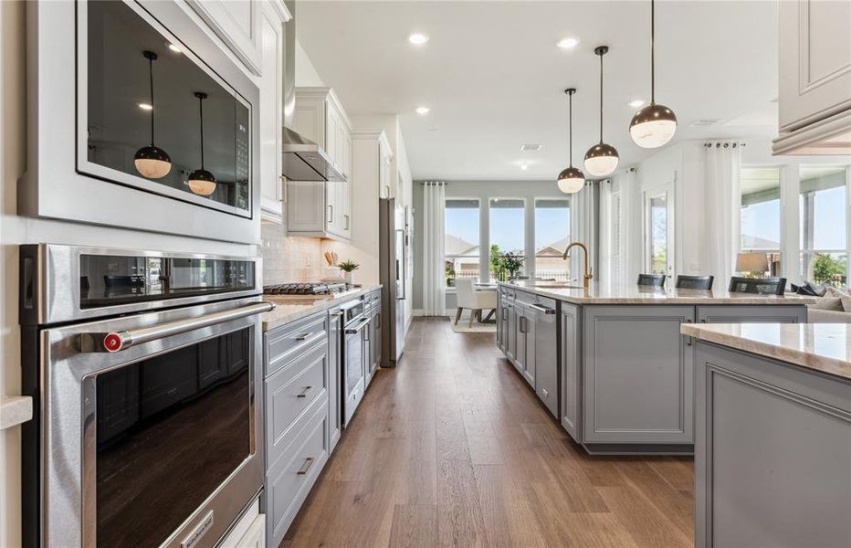 Kitchen featuring a large island ideal for informal dining and gatherings  *Real home pictured