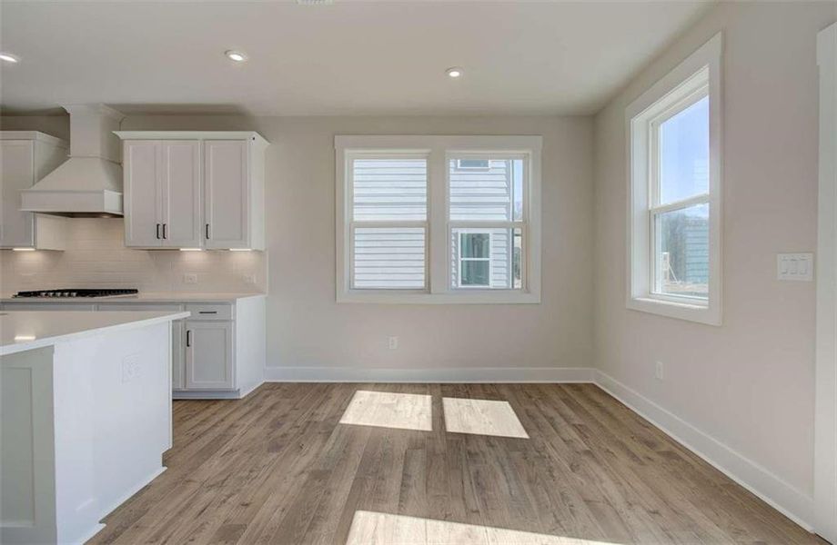 Spacious, unfurnished interior of a new home in The Paddocks at Doc Hughes, Buford (Image 27).
