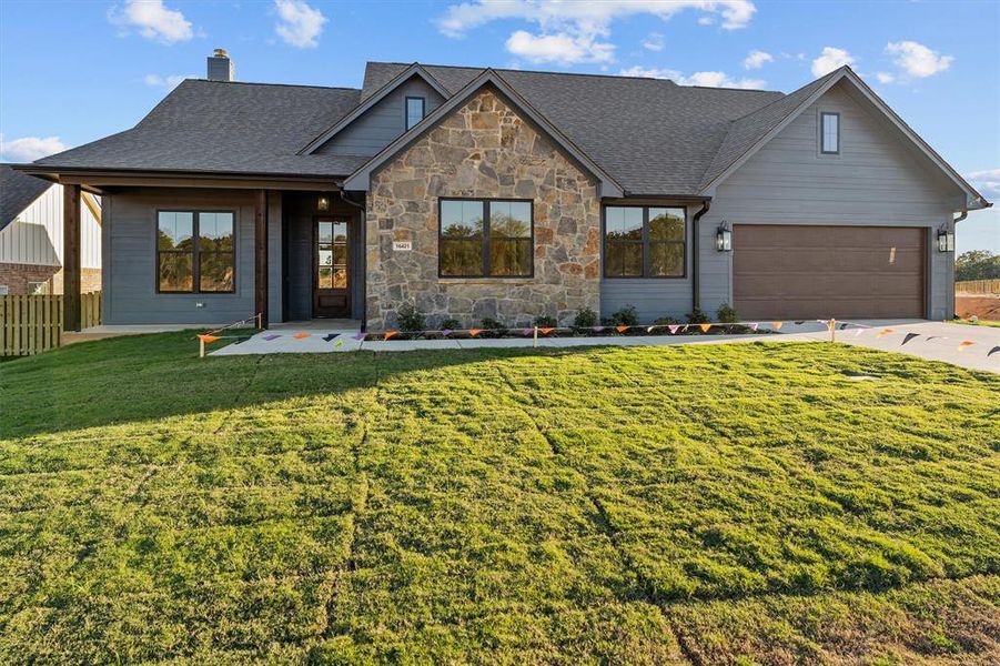 Front exterior of a new home in , Lindale, TX, highlighting curb appeal (Image 18). Front exterior of a new home in , Lindale, TX, highlighting curb appeal (Image 18).