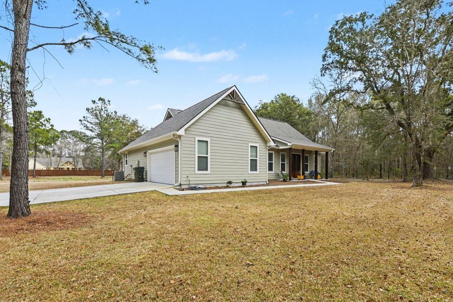Exterior details and patio area of a home in , Johns Island (Image 24).