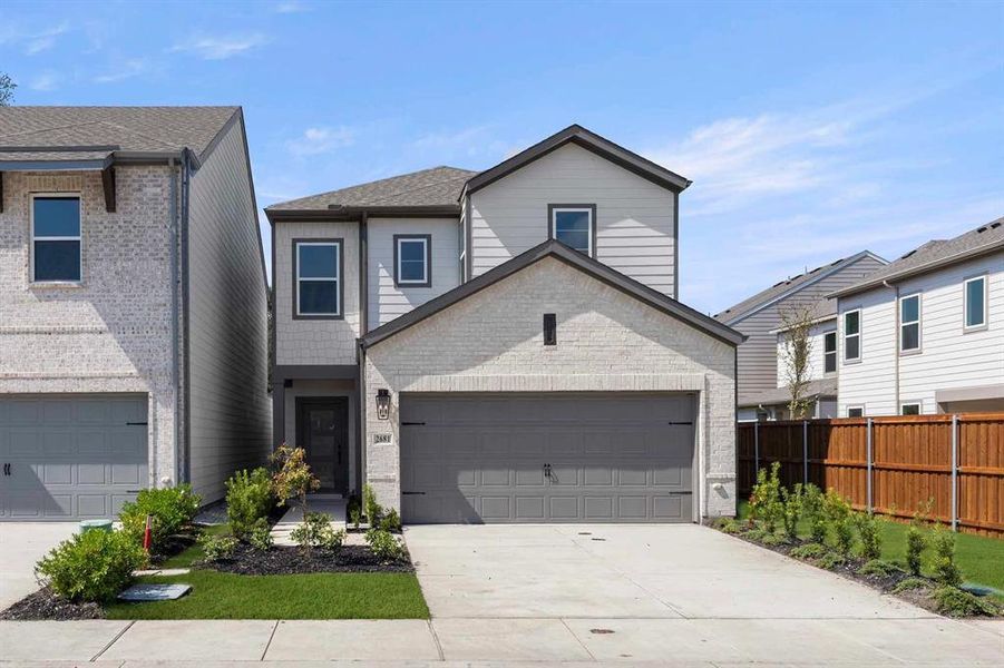Front exterior of a new home in Sereno Oaks at Buckner Terrace, Dallas, TX, highlighting curb appeal (Image 1).