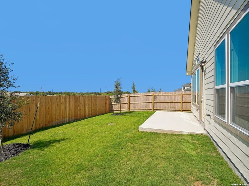 Exterior details and patio area of a home in Talley Fields, San Antonio (Image 3).