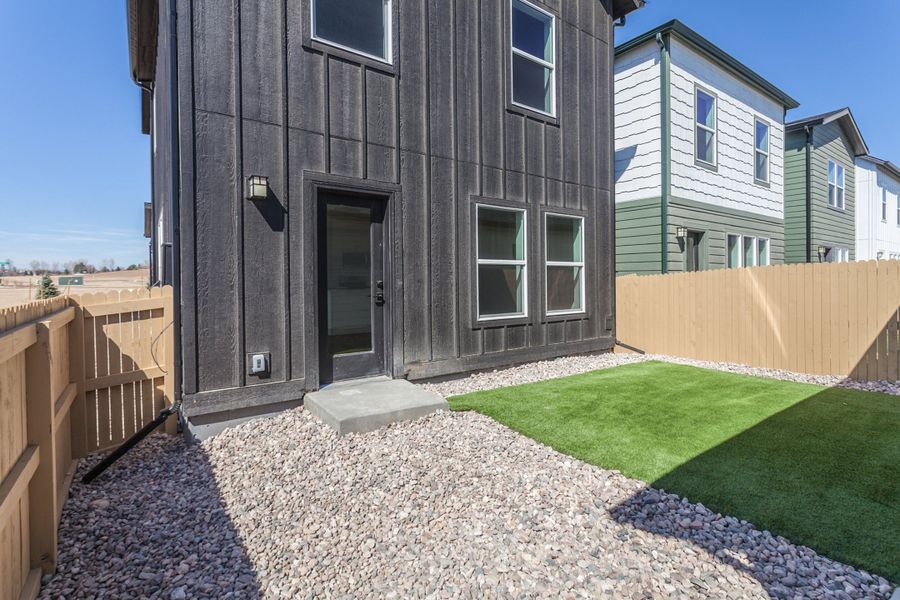 Exterior details and patio area of a home in Prairie Song, Windsor (Image 3). Exterior details and patio area of a home in Prairie Song, Windsor (Image 3).