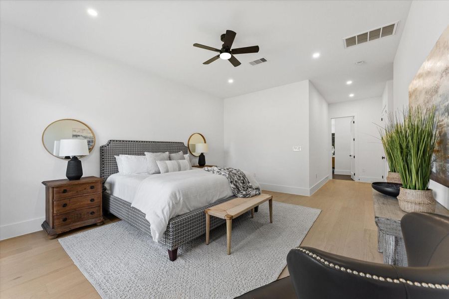 Spacious and serene primary bedroom with modern design, featuring sleek finishes and ample natural light. Perfect for relaxation. Spacious and serene primary bedroom with modern design, featuring sleek finishes and ample natural light. Perfect for relaxation.