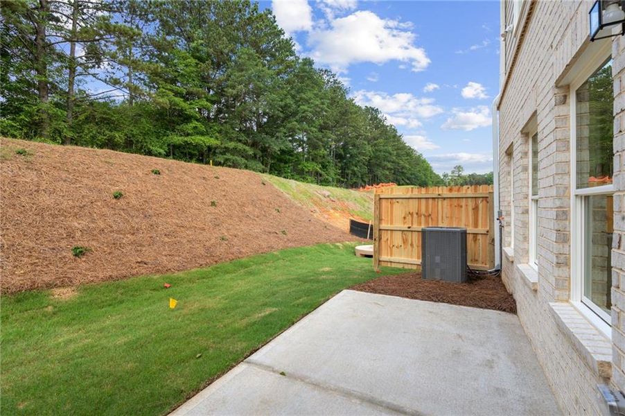 Exterior details and patio area of a home in Wildwood Place, Powder Springs (Image 3).